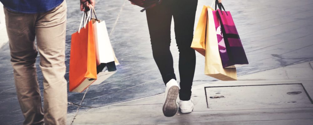 people-walking-with-shopping-bags-min